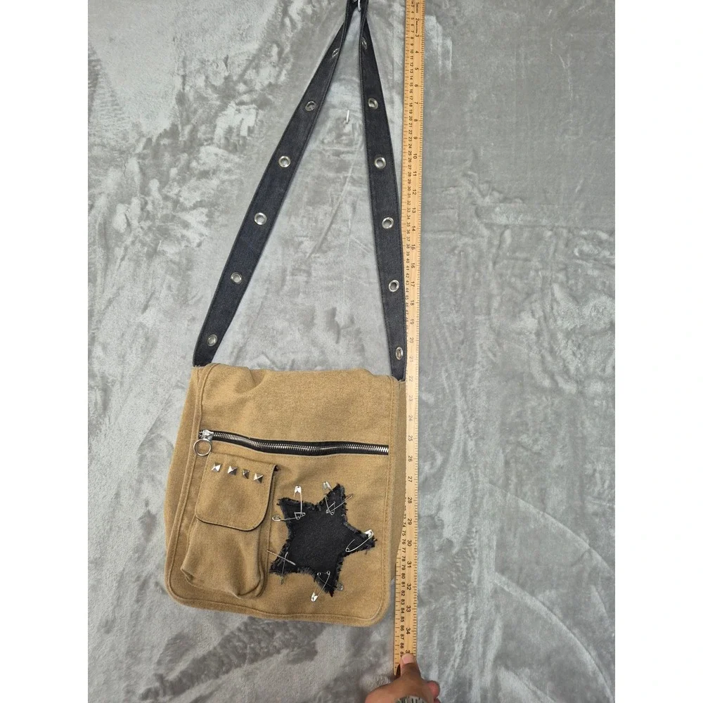 Hot Topic Tan Canvas Messenger Bag Black Star Safety Pin Studded Grommet Strap